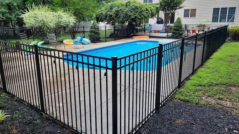 Custom ornamental steel fencing installed around a residential development