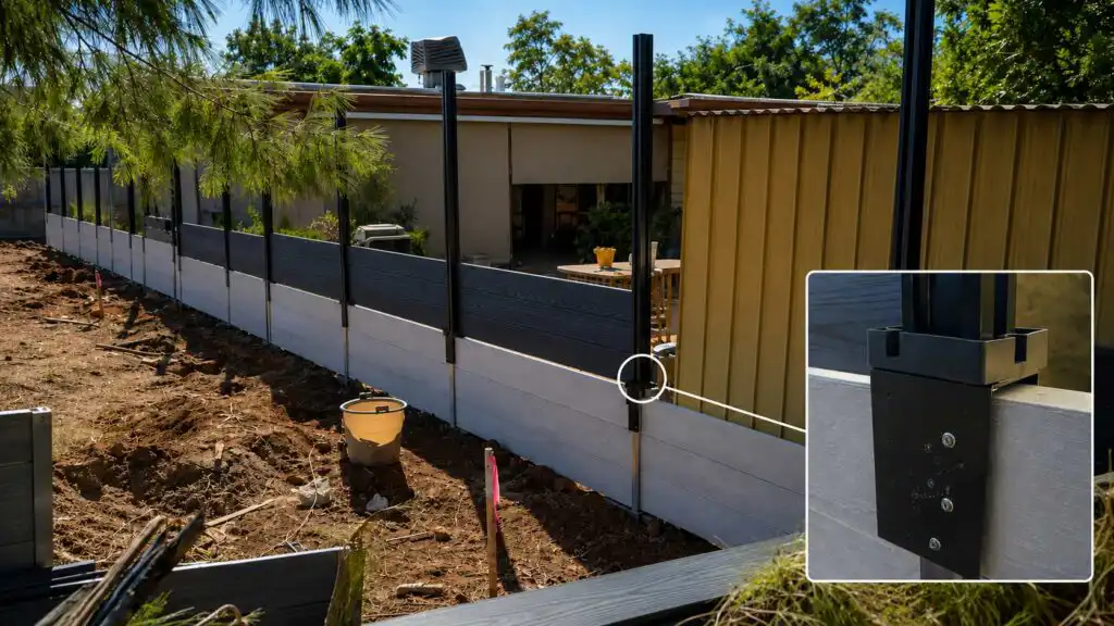 Modular fence installation in progress with steel fence panels and posts